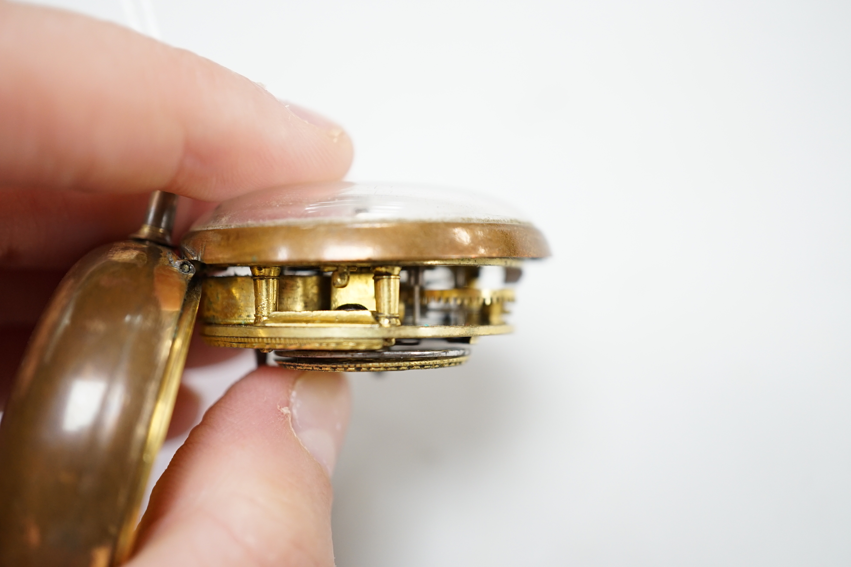 An 18th century gilt metal pair cased keywind verge pocket watch, by William Hope, London, with Roman dial, the signed movement numbered 1523.
